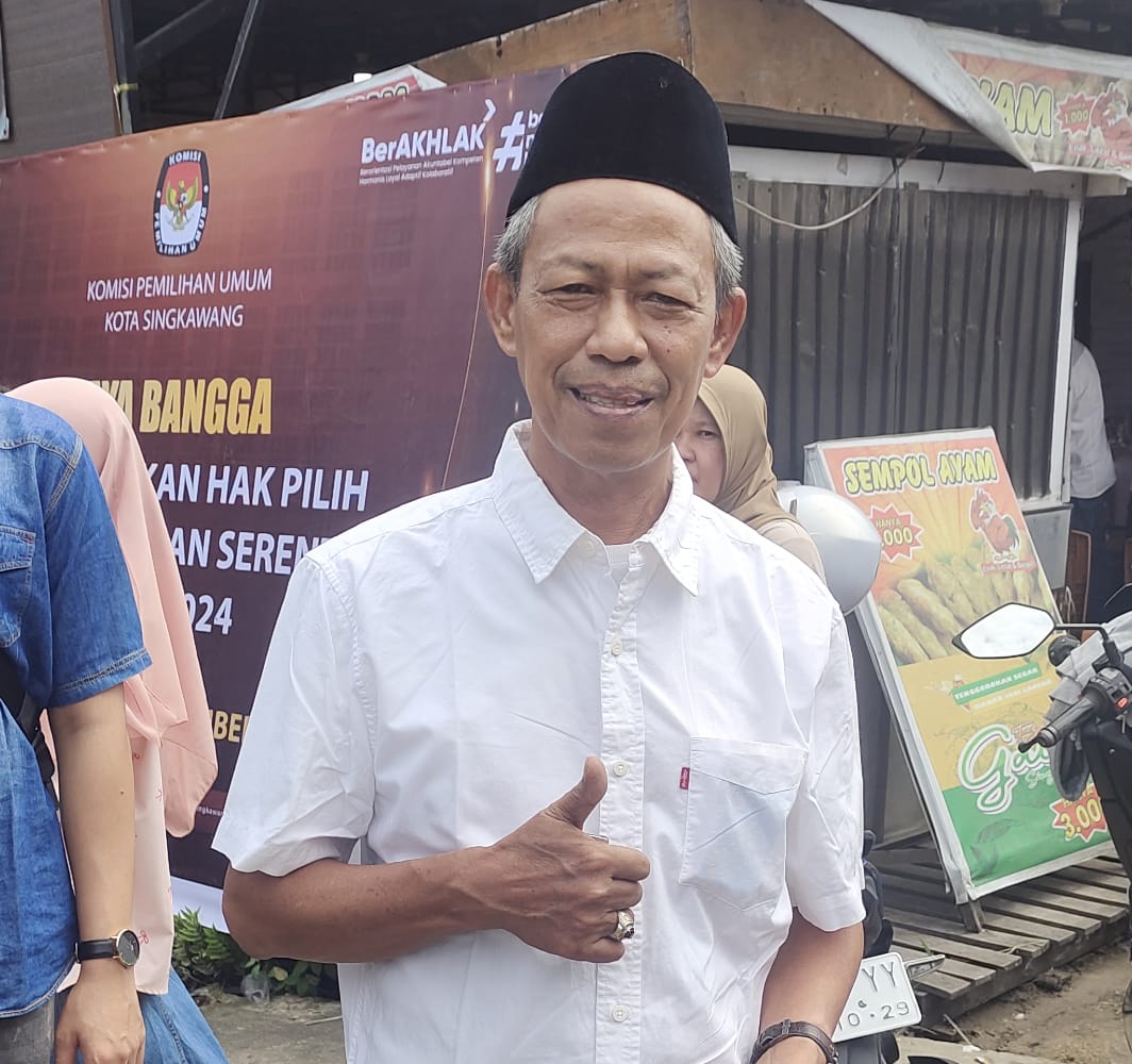 Pencoblosan Abdul Muthalib Bersama Keluarga: Komitmen untuk Pilkada Adil dan Bermartabat