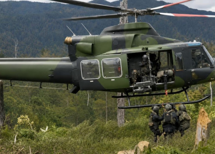 Di Tengah Ancaman Konflik, 11 Prajurit Koops TNI Habema Evakuasi Warga Ugimba dengan Dua Helikopter
