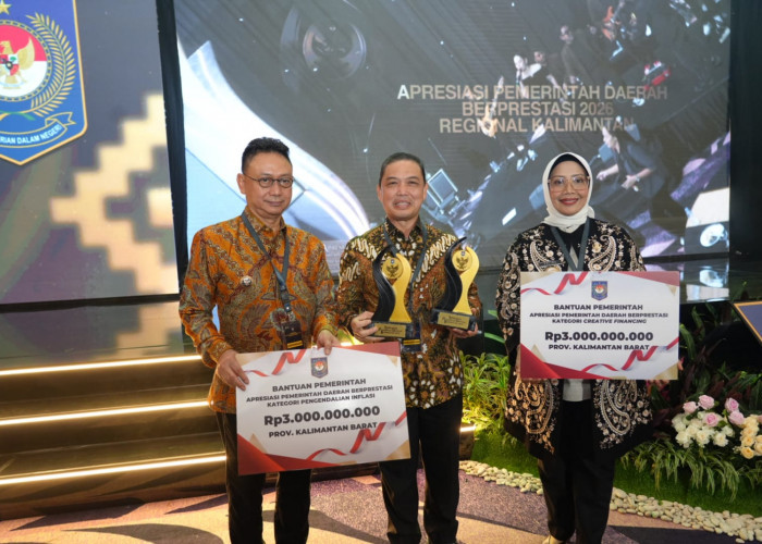 PROGRAM INFLASI BERDAMPAK KE MASYARAKAT, RIA NORSAN RAIH DUA PENGHARGAAN.