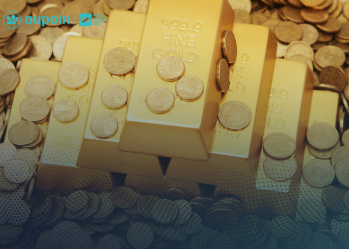Harga Emas Turun Tipis di Tengah Spekulasi Kebijakan Hawkish The Fed